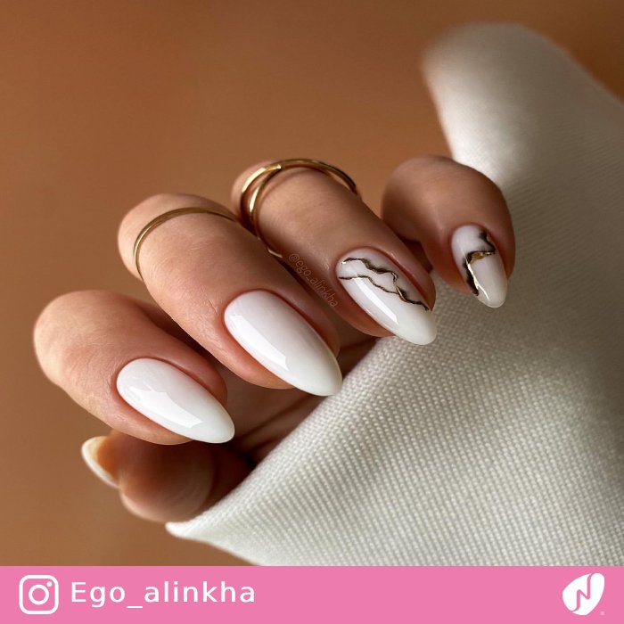 Glossy Almpnd Nails with Swirls